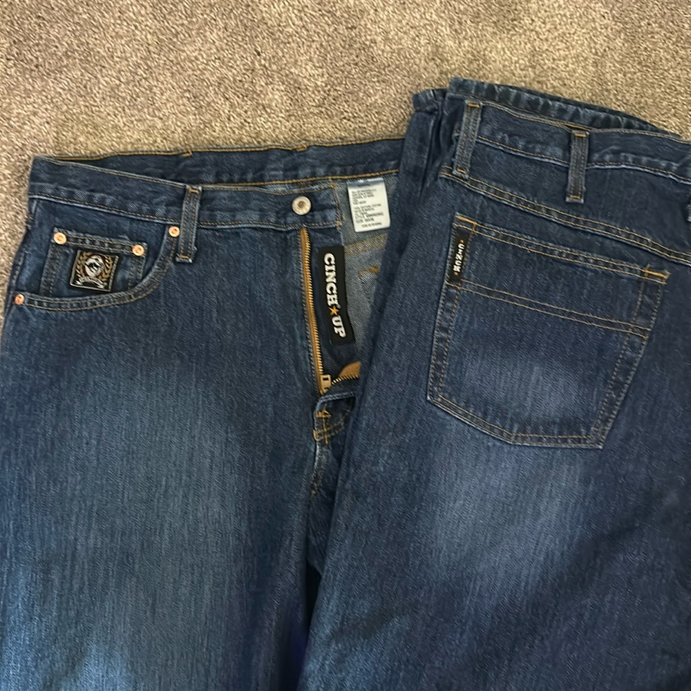 Cinch men’s Black Label Loose Fit Jeans, both sizes are 35/38